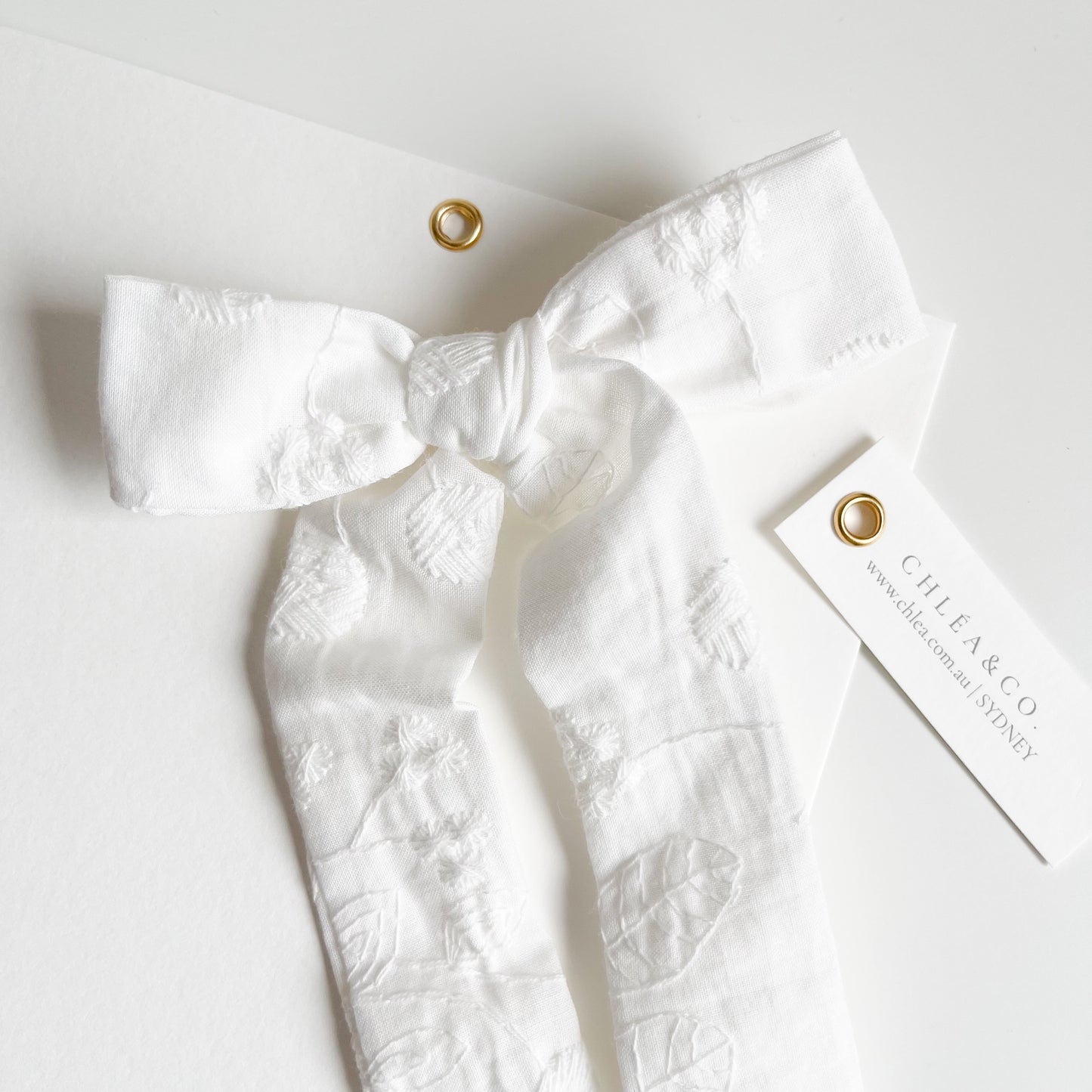 Eila White Long Tail Bow