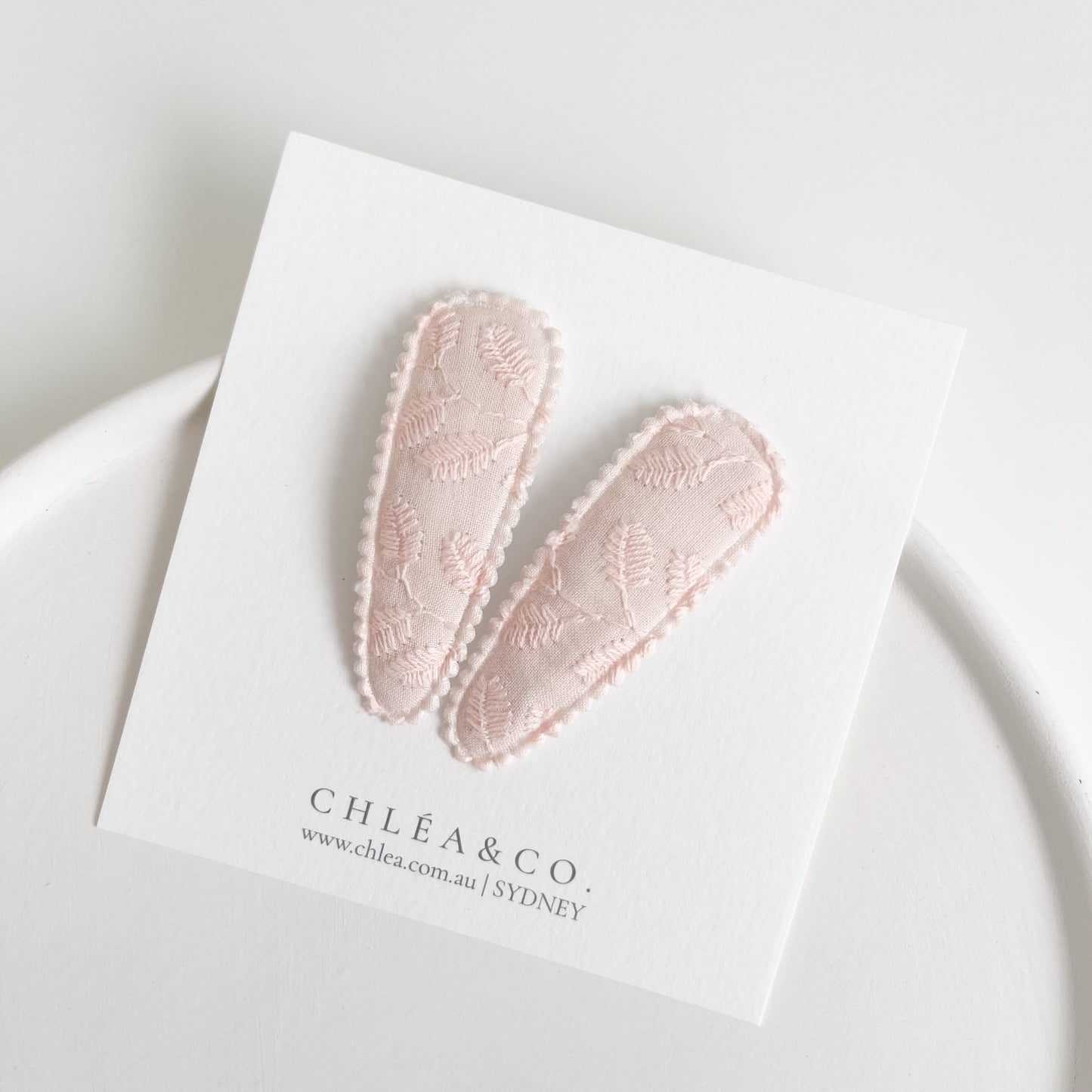 Embroidered Apricot Fabric Covered Snap Clip