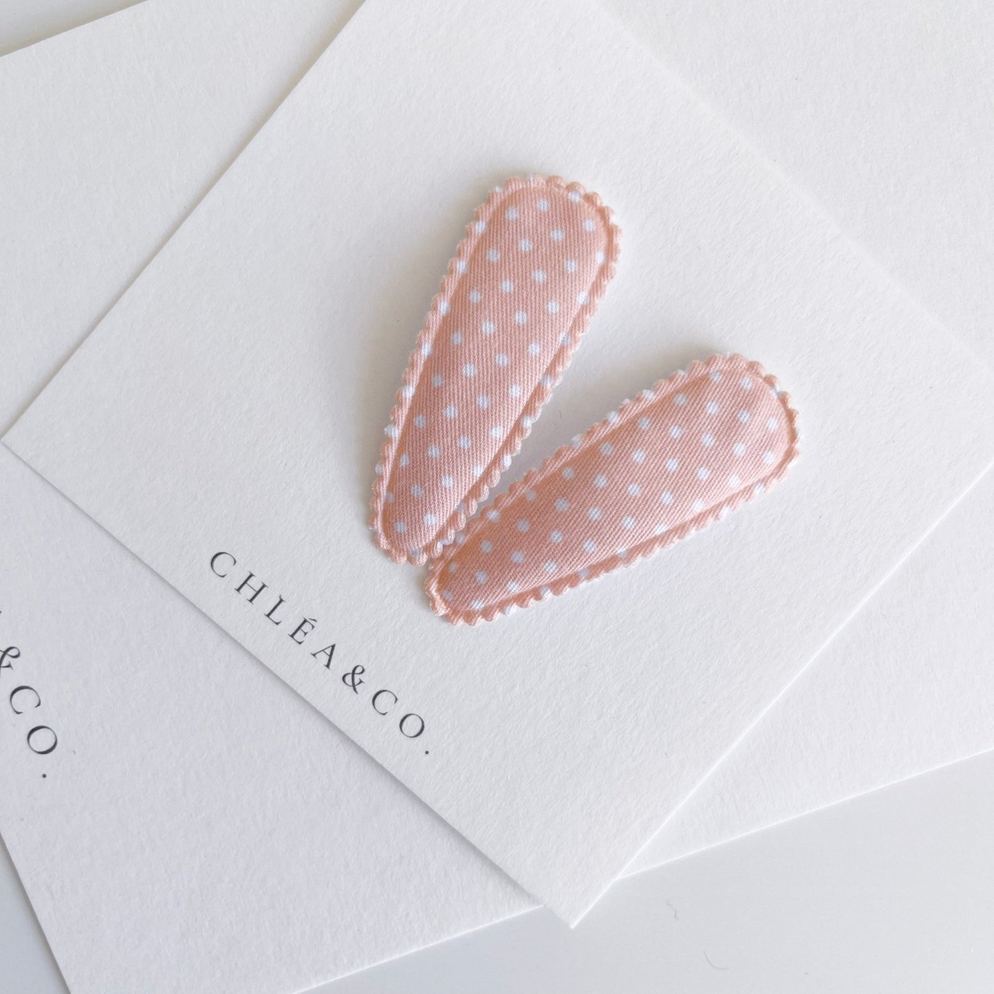 Ava Pastel Peach Fabric Covered Snap Clip - Chléa & Co.