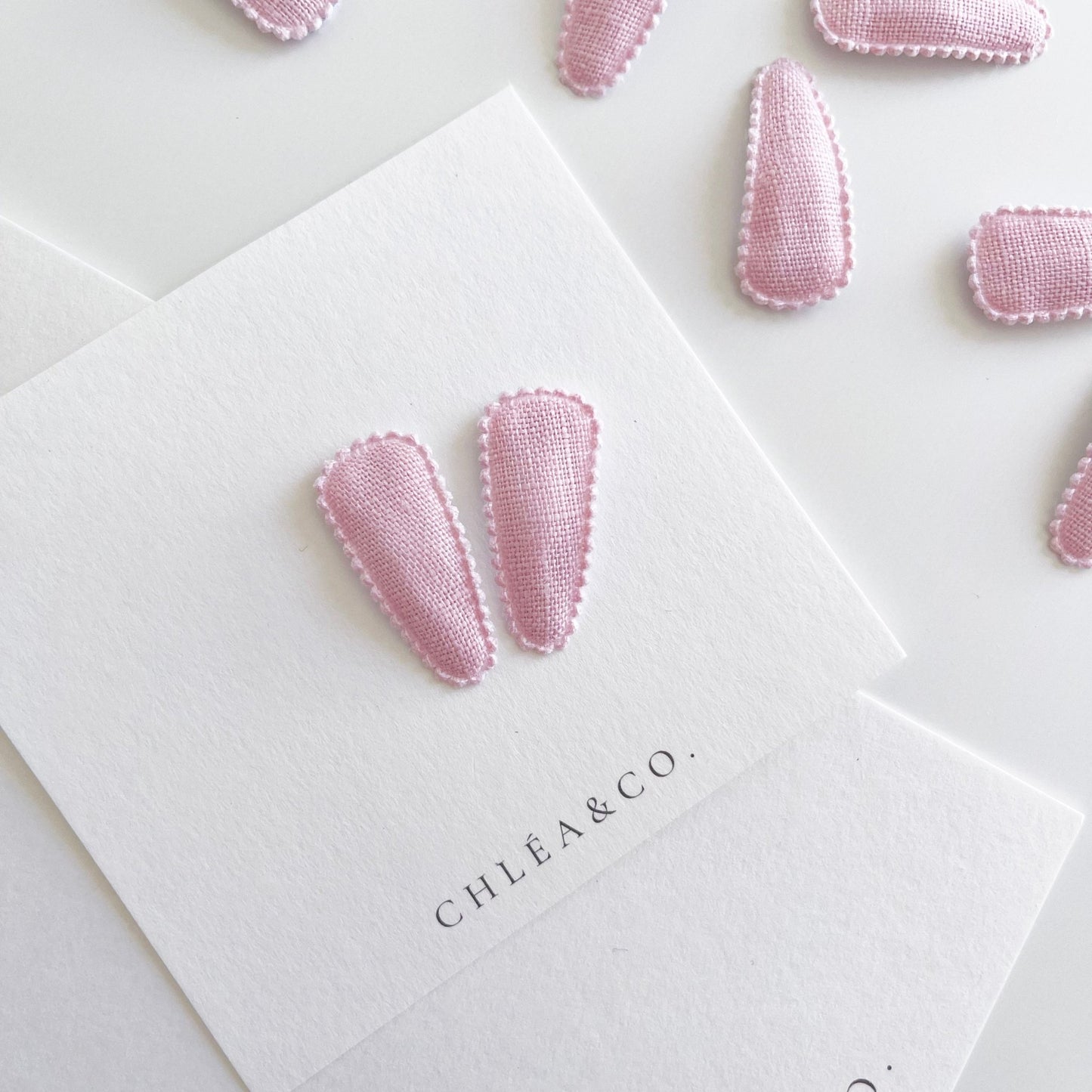 Petite Macaroon Pink Fabric Covered Snap Clip - Chléa & Co.
