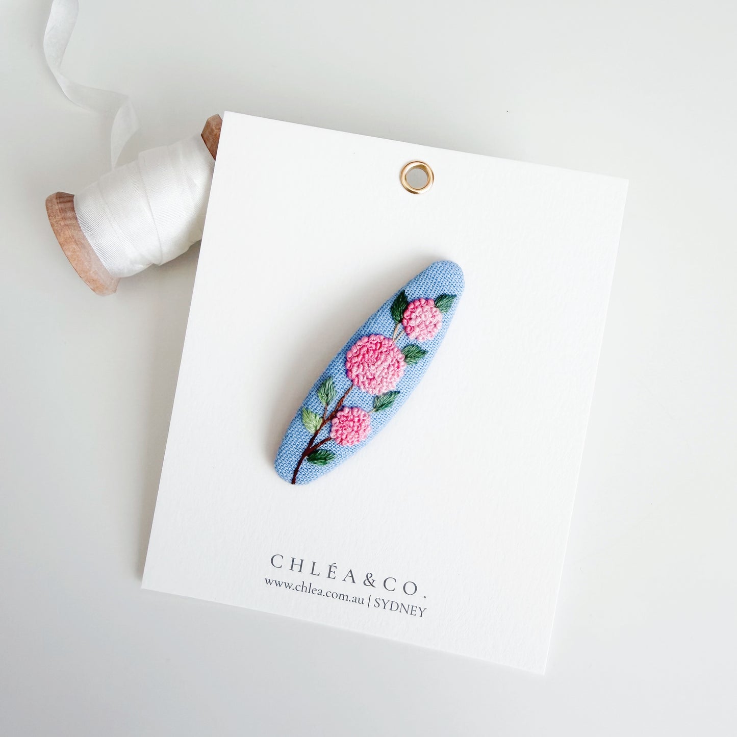 Pink Hydrangea On Blue Linen | Embroidered Oval Hair Clip