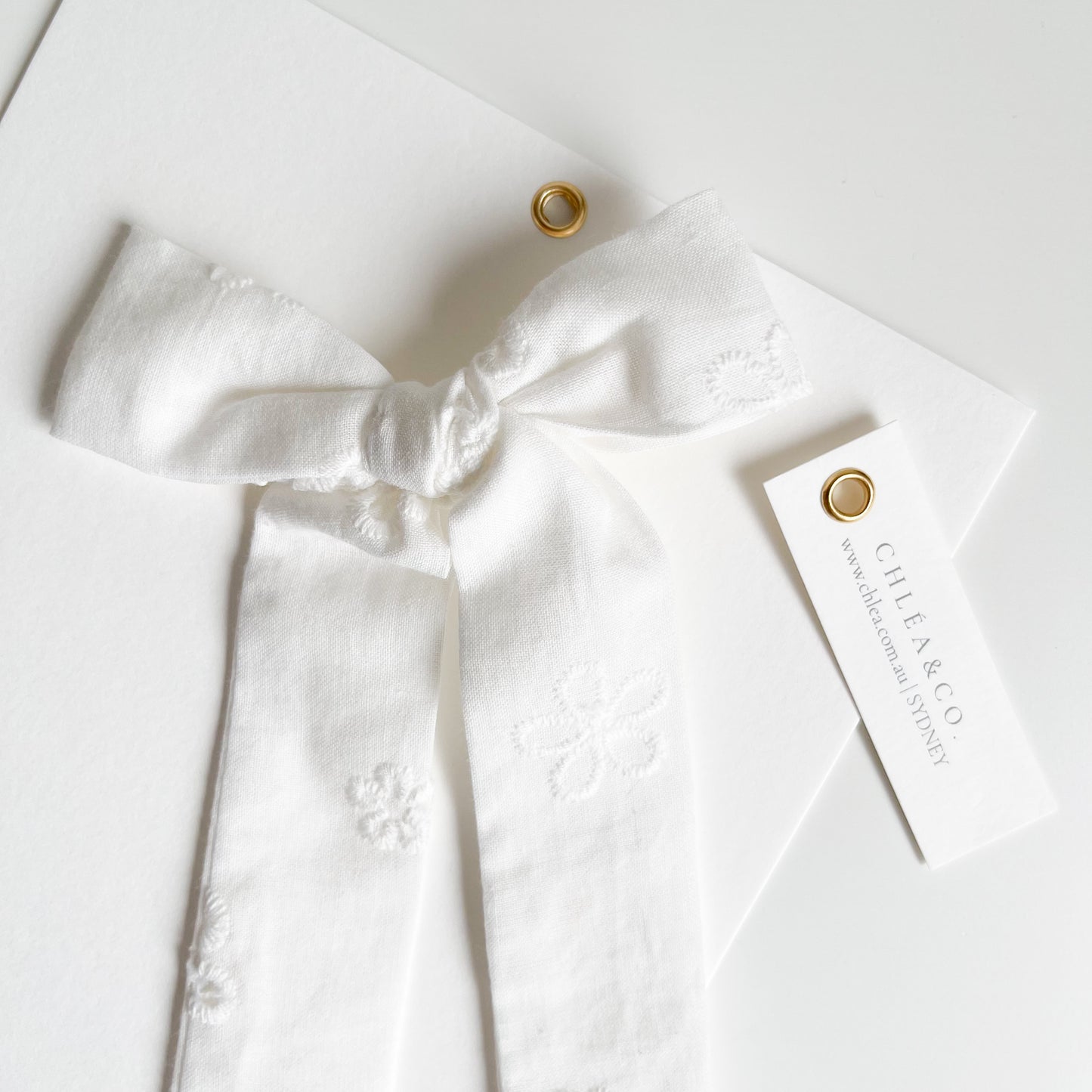 Yvette White Long Tail Bow