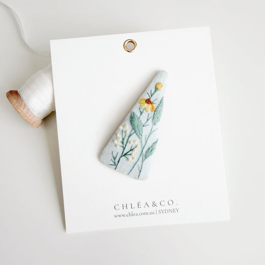 Embroidered Wildflower On Blue Linen