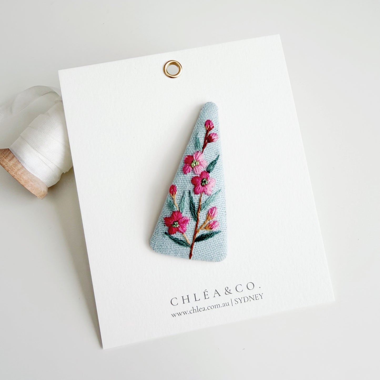 Embroidered Spring Flowers On Blue Linen