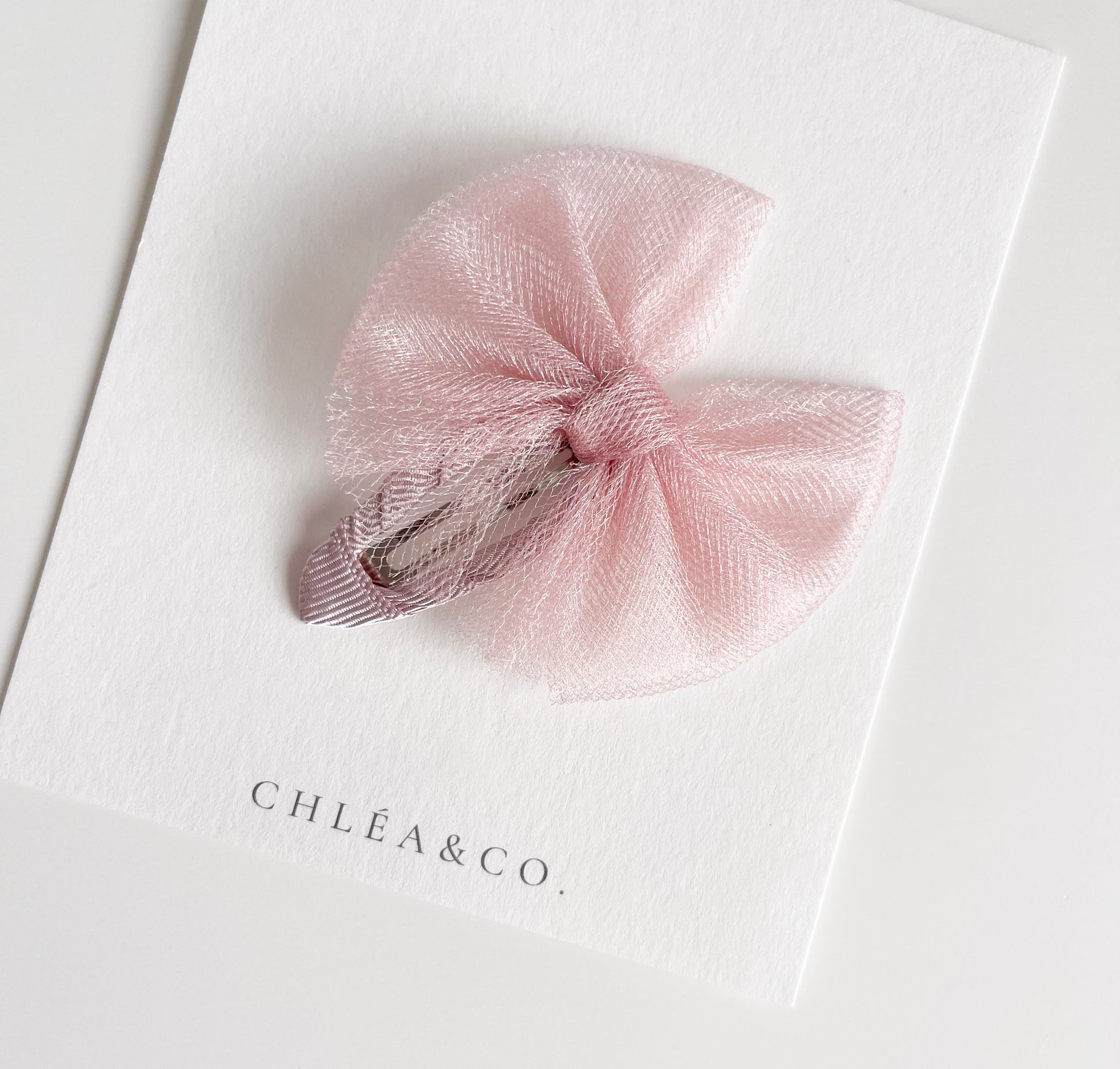 Aurora tulle snap clip in rose colour. Beautiful hair bow for everyday wear and special occasions such as wedding, flower girl, baptism, christening, birthday outfit and photoshoot. 