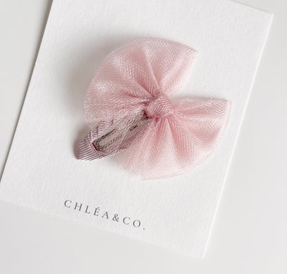 Aurora tulle snap clip in rose colour. Beautiful hair bow for everyday wear and special occasions such as wedding, flower girl, baptism, christening, birthday outfit and photoshoot. 