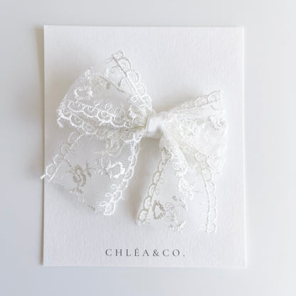 Autumn Lace Bow in white colour. Beautiful hair bow for everyday wear and special occasions such as wedding, flower girl, baptism, christening, birthday outfit and photoshoot. 