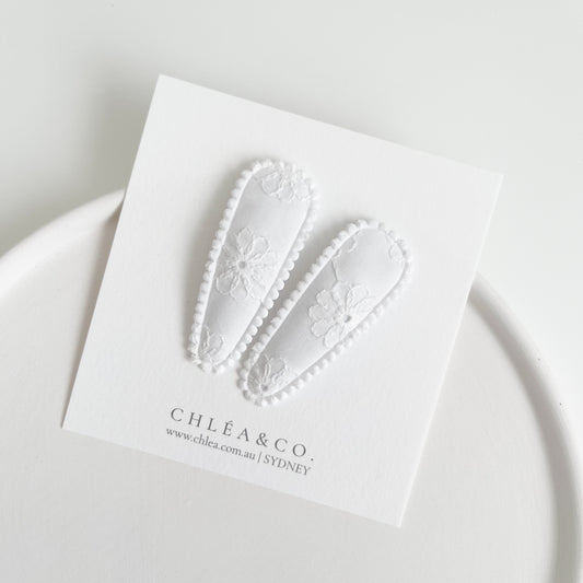 White Fleur Fabric Covered Snap Clip