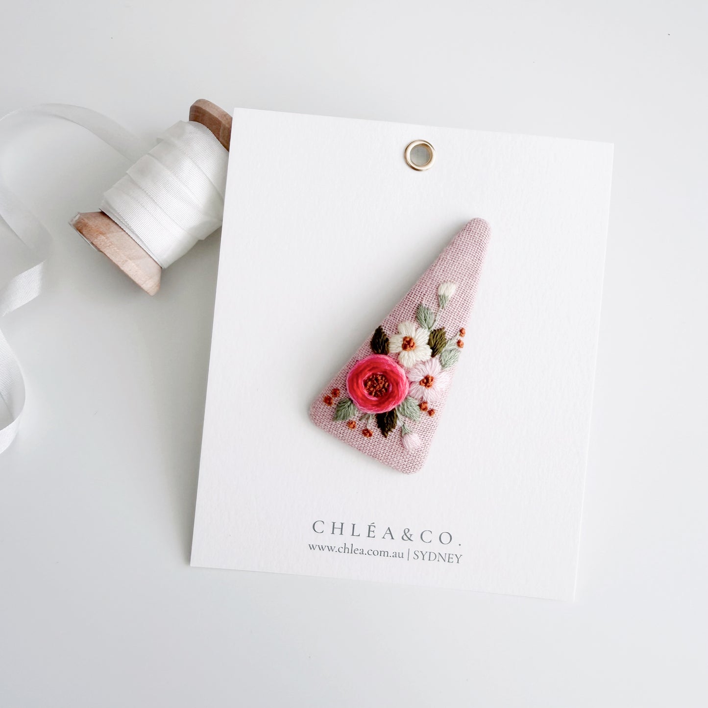 Embroidered Rose On Pink Linen