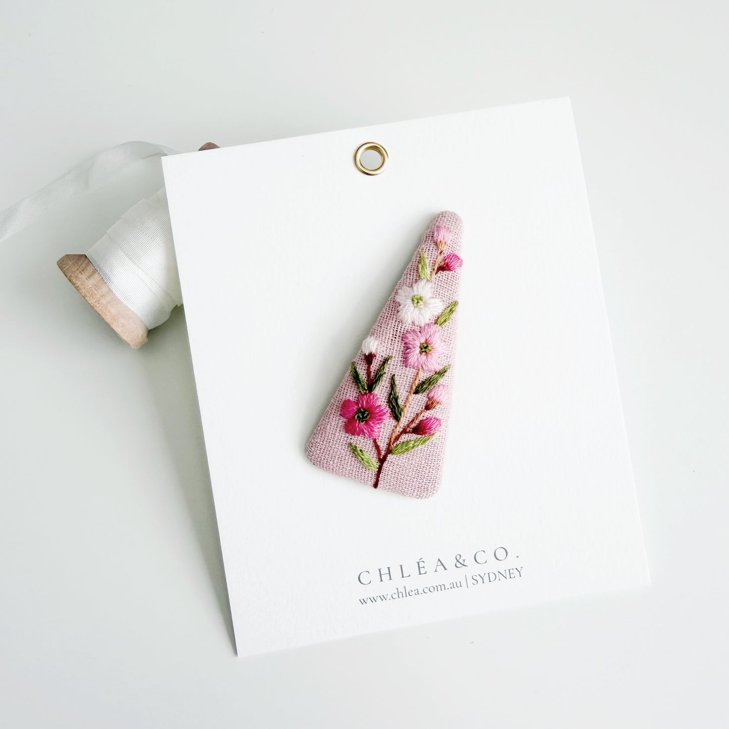Embroidered Spring Flowers On Pink Linen
