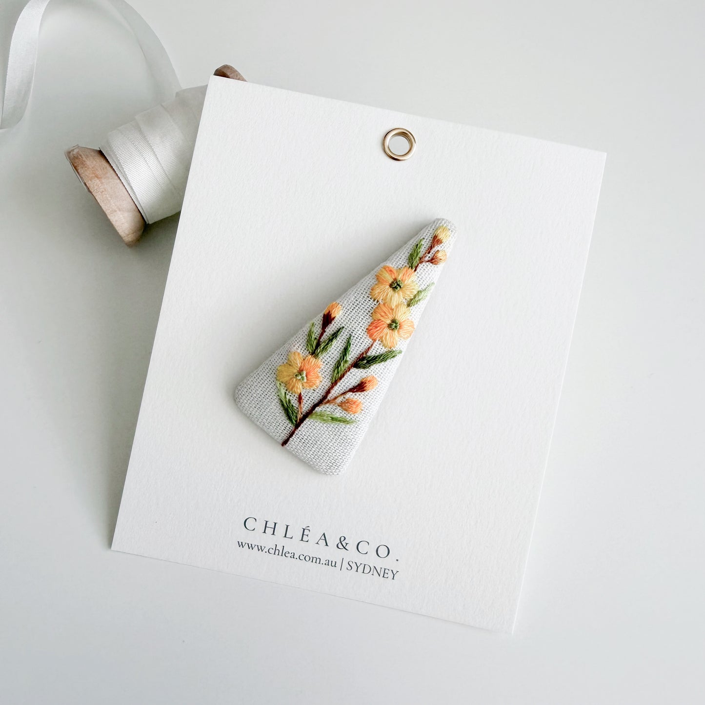 Embroidered Spring Flowers On Grey Linen