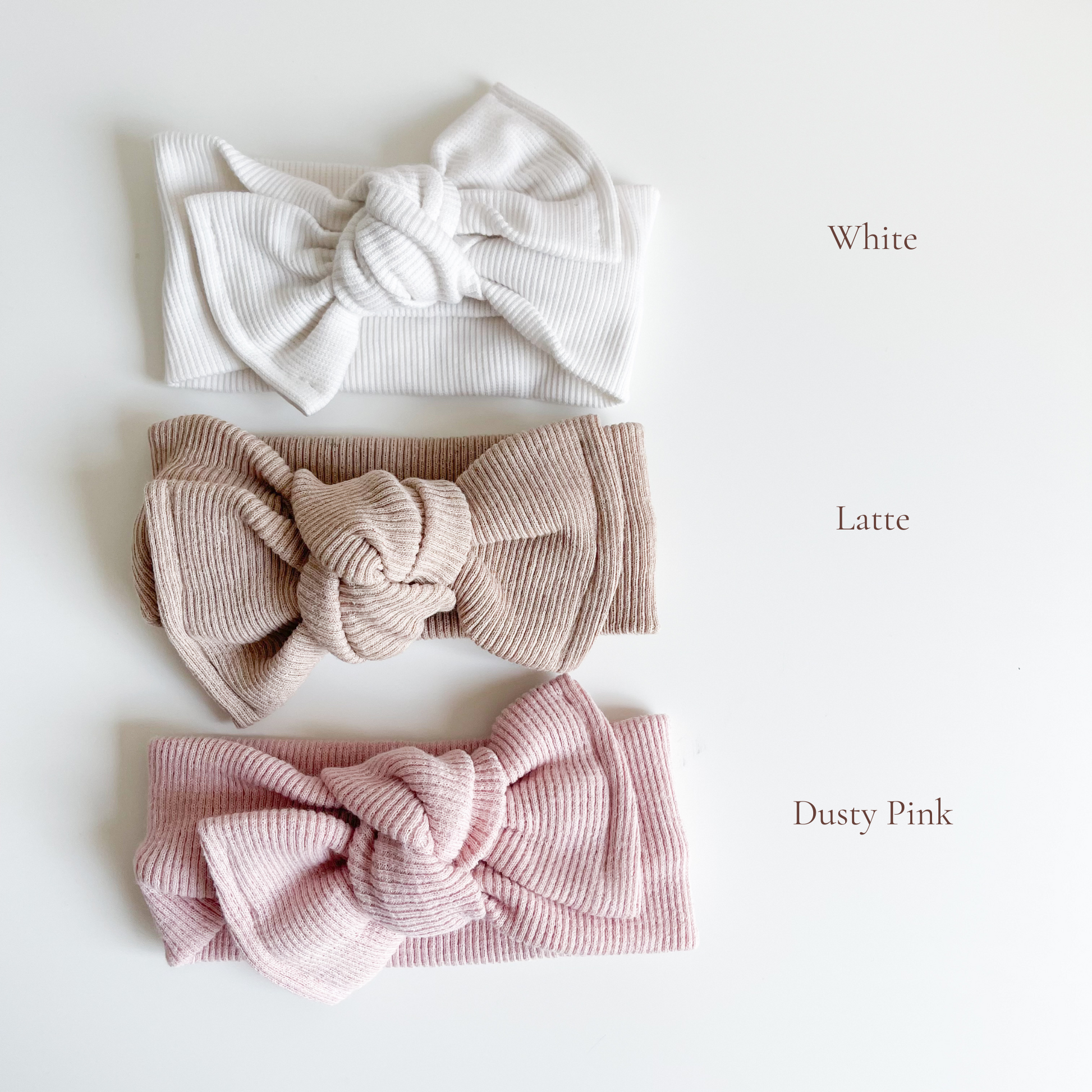 Topknot headband for newborn and babies available in white, latte, dusty pink colour. Beautiful hair bow for everyday wear and special occasions such as wedding, flower girl, baptism, christening, birthday outfit and photoshoot.