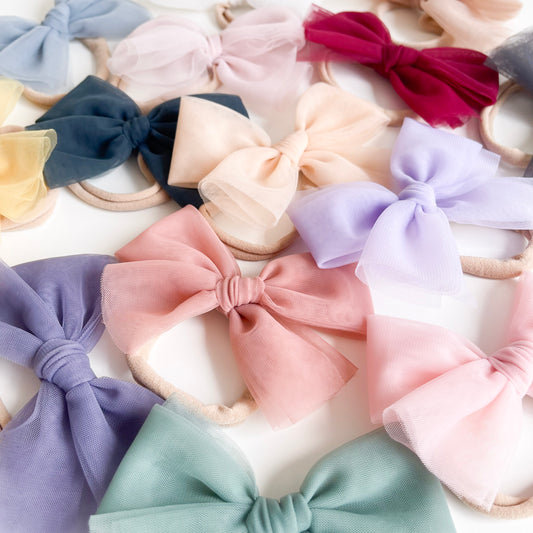 Soft tulle bow headband in 23 colours colour. Beautiful hair bow for everyday wear and special occasions such as wedding, flower girl, baptism, christening, birthday outfit and photoshoot.