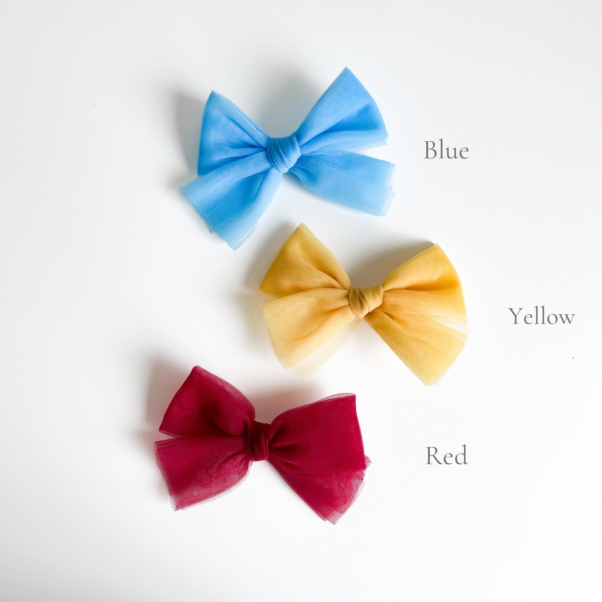 Tulle hair bow clip available in 23 colours. Beautiful hair bow for everyday wear and special occasions such as wedding, flower girl, baptism, christening, birthday outfit and photoshoot.