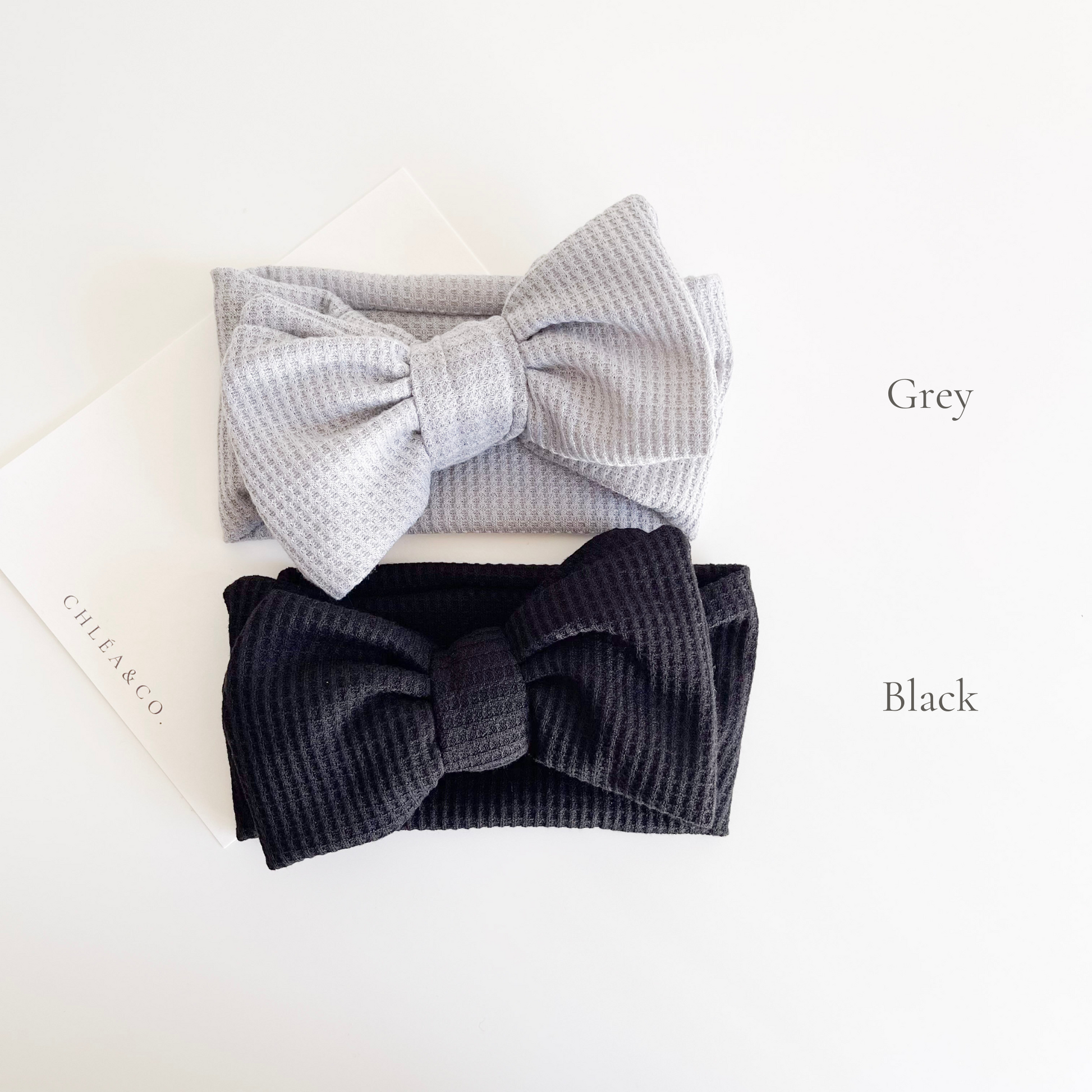 Waffle Bow Headband in grey and black colours. Beautiful hair bow for everyday wear and special occasions such as wedding, flower girl, baptism, christening, birthday outfit and photoshoot.