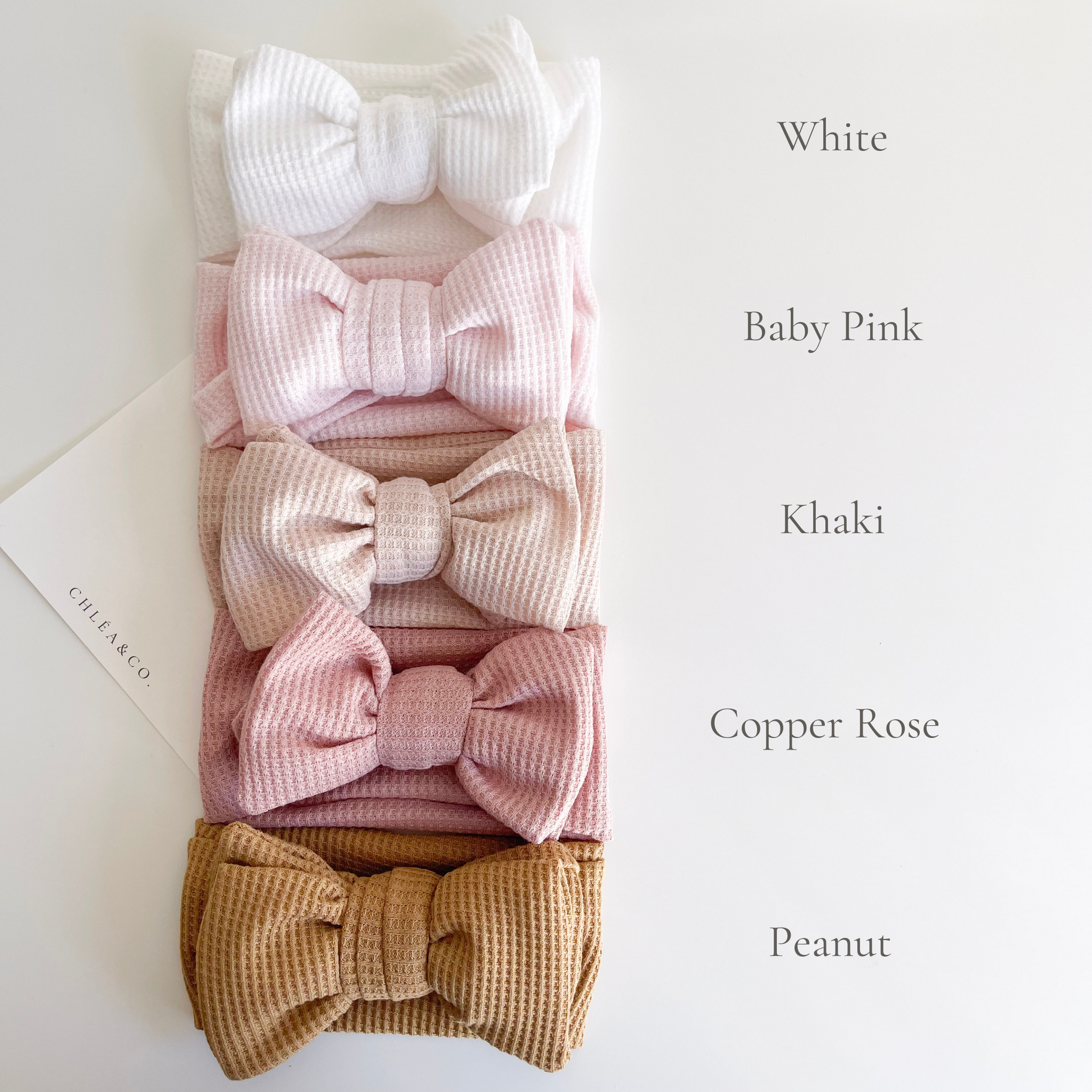 Waffle Bow Headband in white, khaki, baby pink, copper rose and peanut colours. Beautiful hair bow for everyday wear and special occasions such as wedding, flower girl, baptism, christening, birthday outfit and photoshoot.