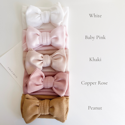 Waffle Bow Headband in white, khaki, baby pink, copper rose and peanut colours. Beautiful hair bow for everyday wear and special occasions such as wedding, flower girl, baptism, christening, birthday outfit and photoshoot.