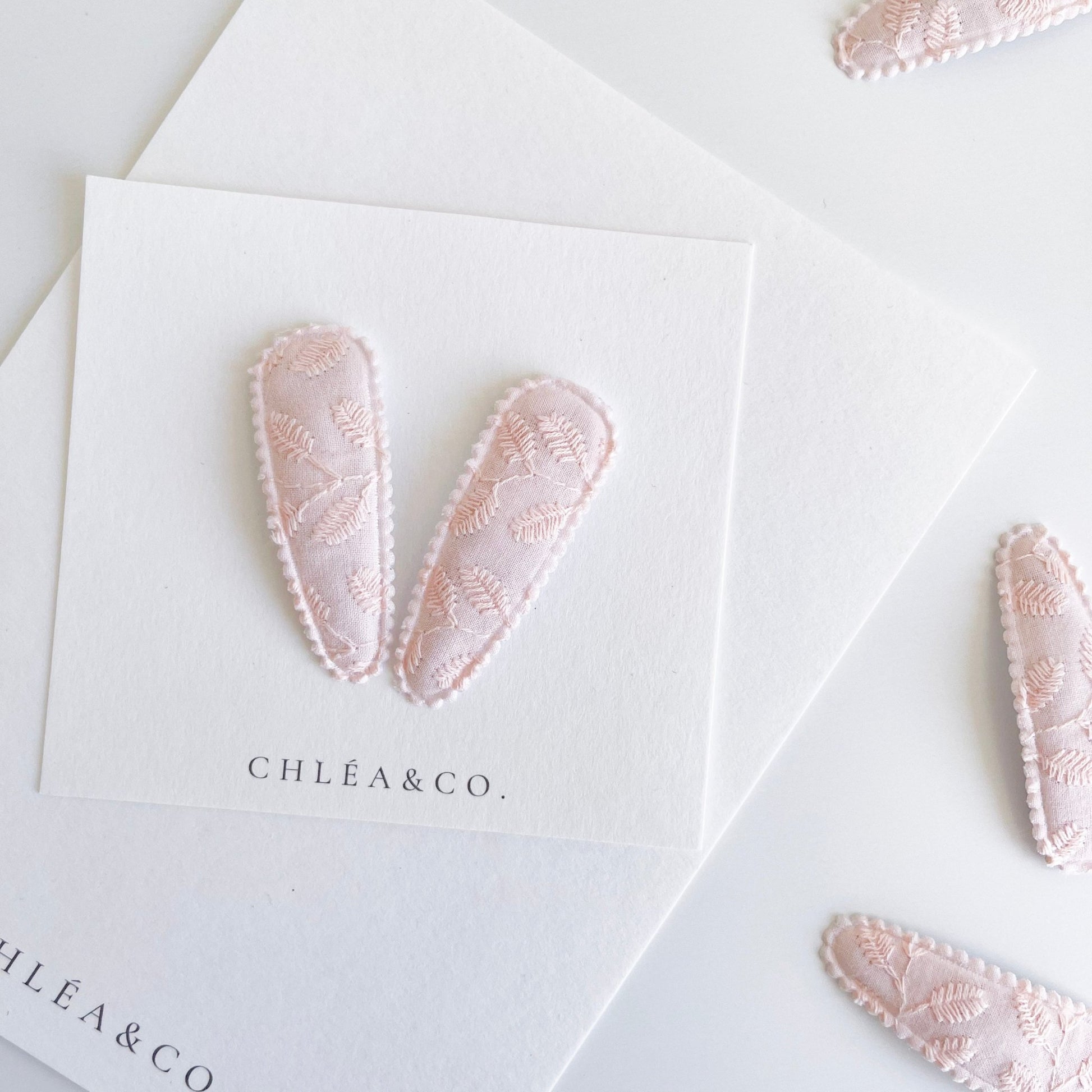 Embroidered Apricot Fabric Covered Snap Clip - Chléa & Co.