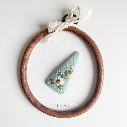 Embroidered Daisy On Powder Blue Linen - Chléa & Co.