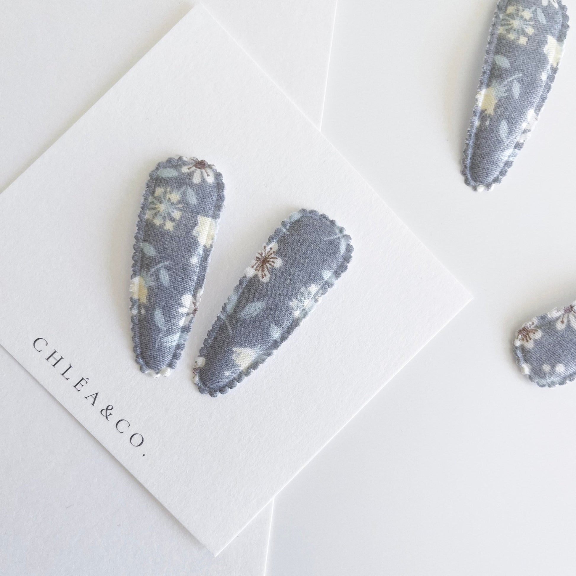 Grace Fabric Covered Snap Clip - Chléa & Co.